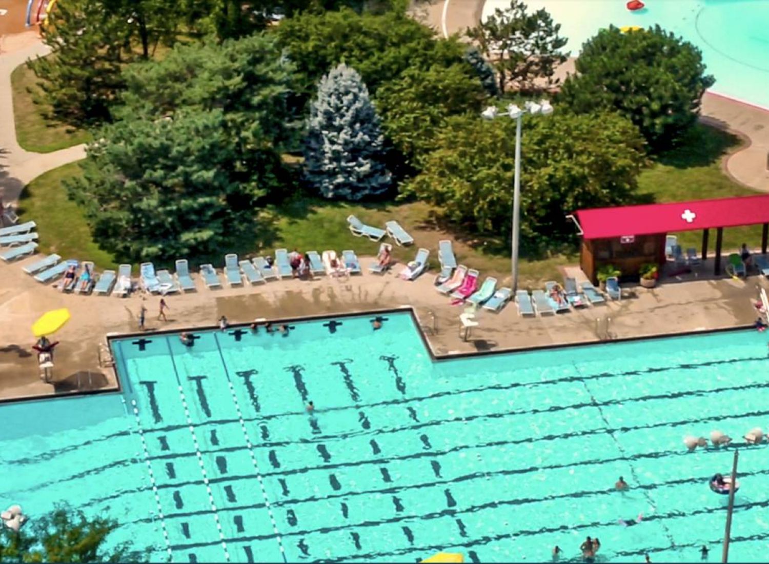Mission 106 Luxury Apartments in Leawood, KS neighborhood with an aerial view of Leawood Aquatic Center