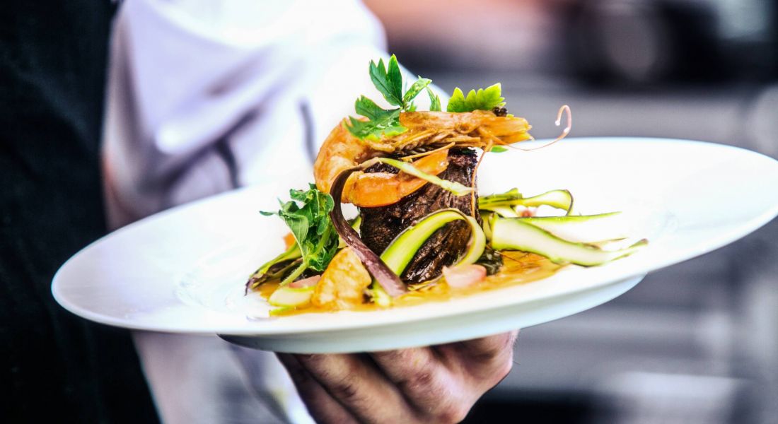 Mission 106 Luxury Apartments and surrounding neighborhood restaurants with closeup of stylish fine dining plate in a restaurant